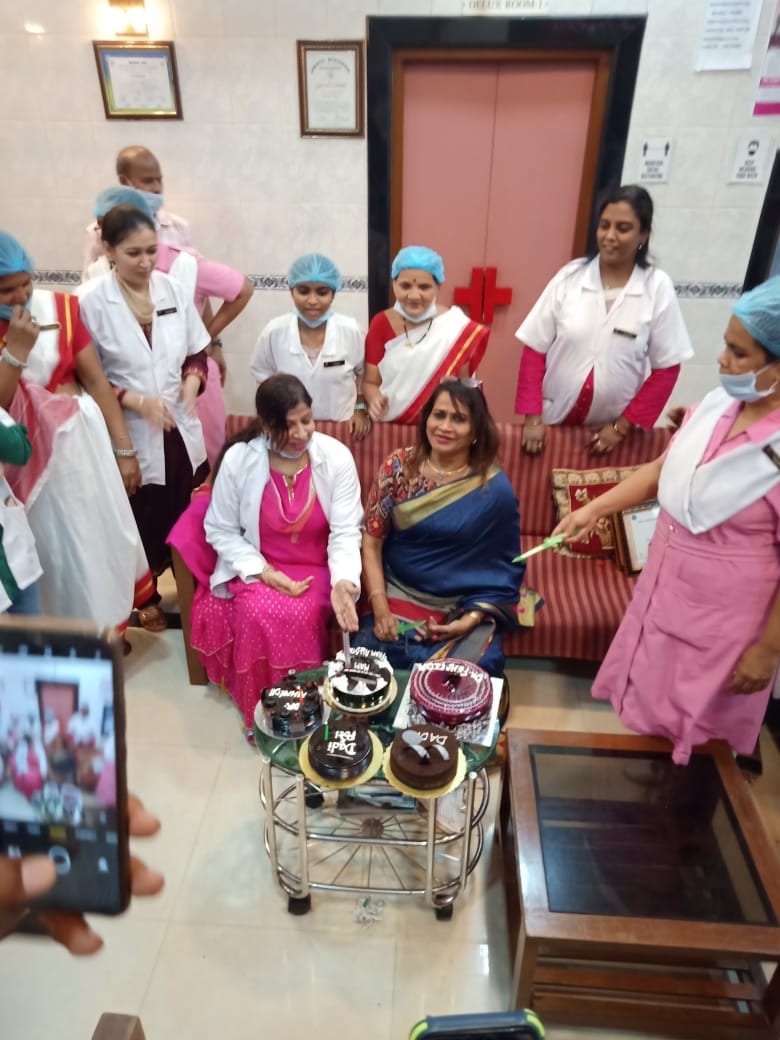 Staff cake-cutting celebration at Fehmida Nursing Home